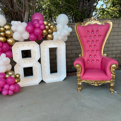 Gold and pink throne chair